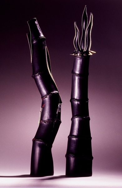 1998 Punk (2 pieces, each 20''x5''x5'') Porcelain, latex, zippers, metal spikes Punk